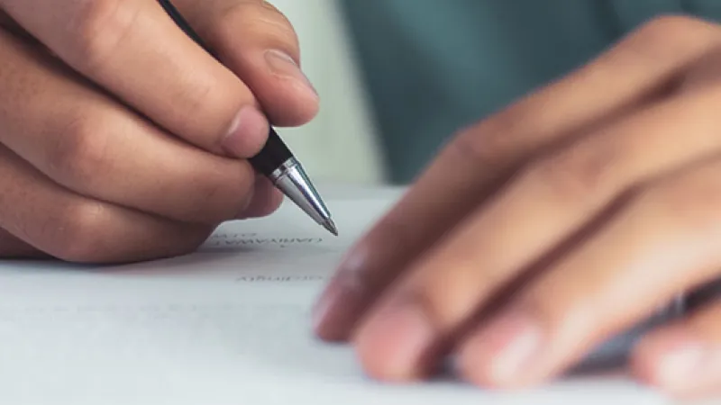 Hand mit Stift