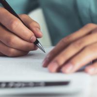 Hand mit Stift